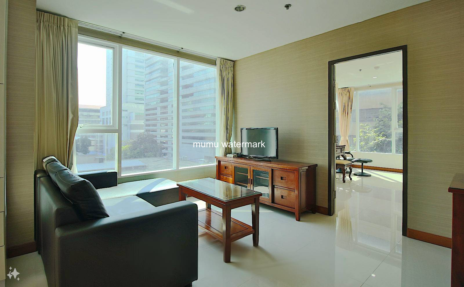 Corner room facing Sukhumvit 21 (Asoke) Road.